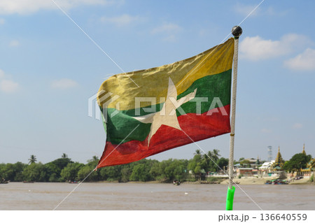 The Myanmar Flag at the Bow of a Boat The Myanmar Flag at the Bow of a Boat 136640559