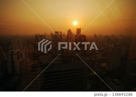 Sunset Amazing Bangkok city skyline with blue sky. Golden time Beautiful skyscraper bangkok midtown landscape. Capital building background modern office district. downtown City night life 136643286