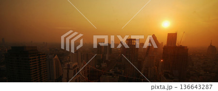 Sunset Amazing Bangkok city skyline with blue sky. Golden time Beautiful skyscraper bangkok midtown landscape. Capital building background modern office district. downtown City night life Sunset Amazing Bangkok city skyline with blue sky. Golden time Beautiful skyscraper bangkok midtown landscape. Capital building background modern office district. downtown City night life 136643287