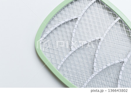 green mosquito swatter isolated on white background 136643802