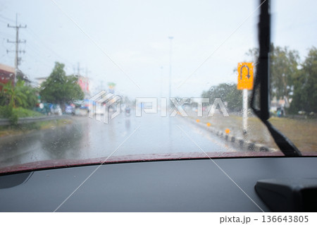 car on highway road with rainny season, blurred image car on highway road with rainny season, blurred image 136643805