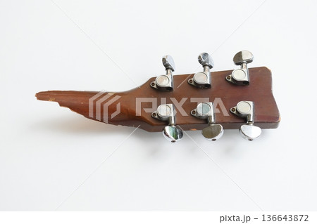 part of broken wood acoustic guitar isolated on white background part of broken wood acoustic guitar isolated on white background 136643872