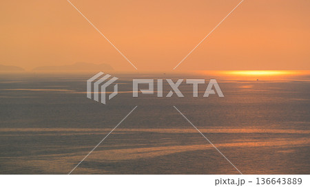 beautiful view of golden sea and sky in the evening, natural background 136643889