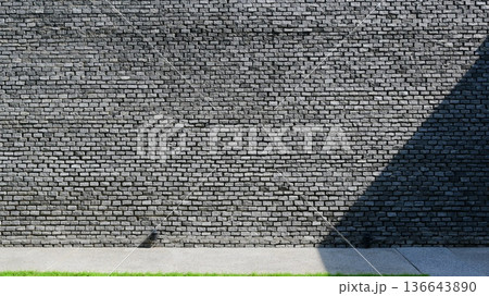 grey brick wall background design with shadow 136643890