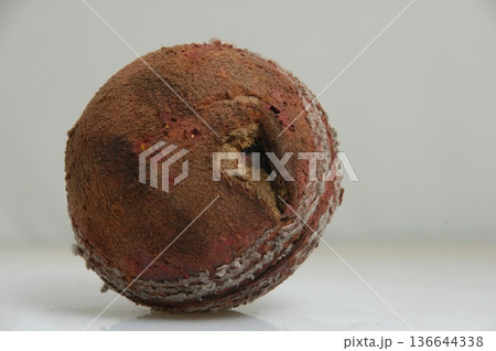 Old Cricket Ball closeup 136644338