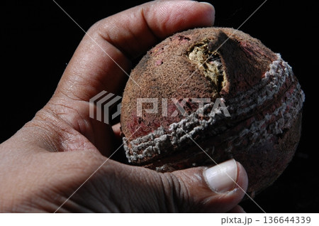 Old Cricket Ball closeup 136644339