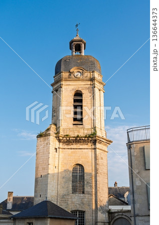 Historic Church Tower Silhouette Against Clear Sky in La Rochelle, France Architecture Historic Church Tower Silhouette Against Clear Sky in La Rochelle, France Architecture 136644373