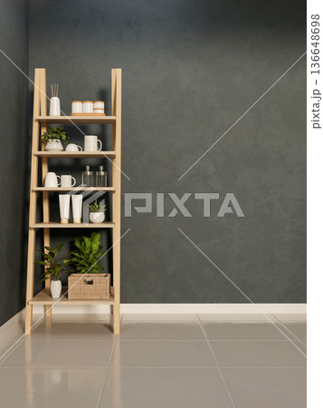 Utensils storage display shelf rack on white tiles floor aside dark color grey wall in room's corner 136648698