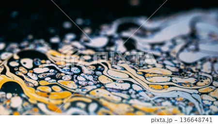 Soap bubble texture. Blur gasoline fluid. Colorful pigment wave spill on water. Yellow orange white ink flow abstract swirl gradient background. 136648741