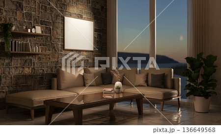 Frame on bricks wall over sofa couch and table on tile floor aside glass window with sunrise scenery 136649568