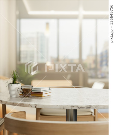 Coffee in glass cup with book and plant on round marble table and wooden chair across window in cafe Coffee in glass cup with book and plant on round marble table and wooden chair across window in cafe 136649756