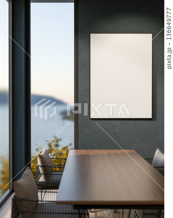 Empty wooden table and metal chairs across white frame on dark grey wall and window with sea view. 136649777