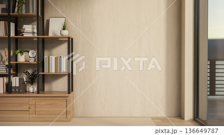 Books and folder on display shelf on parquet floor aside wooden wall and glass window wall in a room 136649787