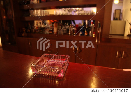 Glass Ash tray on a table 136651017