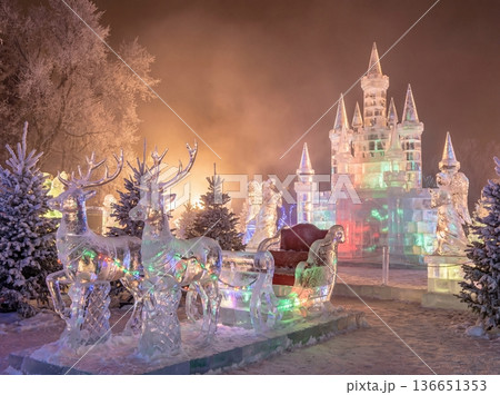 Christmas Ice Sculptures of Reindeer Sleigh and Castle at Winter Festival 136651353