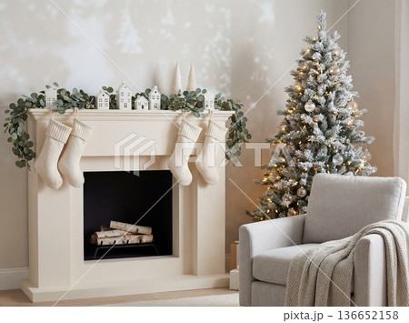 Christmas living room interior with white fireplace stockings and flocked tree 136652158