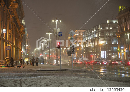 snowfall in the center of Minsk at night 136654364