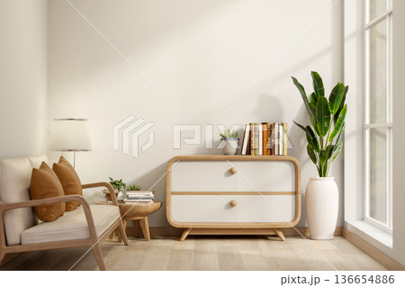 Wooden sofa and drawer cabinet on parquet floor aside white wall with sunlight through glass window. 136654886