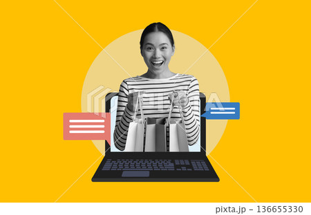 A person smiles while holding shopping bags that come out of a laptop. The background is bright, and speech bubbles are visible on the screen. The scene shows online shopping. A person smiles while holding shopping bags that come out of a laptop. The background is bright, and speech bubbles are visible on the screen. The scene shows online shopping. 136655330