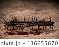 Crown of Thorns covered with blood representing the Crucifixion of Christ on the Cross with space for text or messages. Christianity concept 136655670