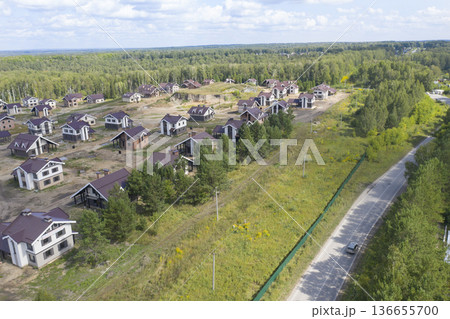 Aerial view of the construction of cottage vilage in Siberia 136655700