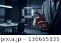 Businessman Pointing at Glowing Microchip CPU Icon in Modern Office 136655835