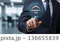Businessman Interacting with Property Tax Digital Interface Icon 136655839