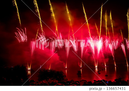 The colorful light of fireworks at Munich Olympiapark, Germany 136657431