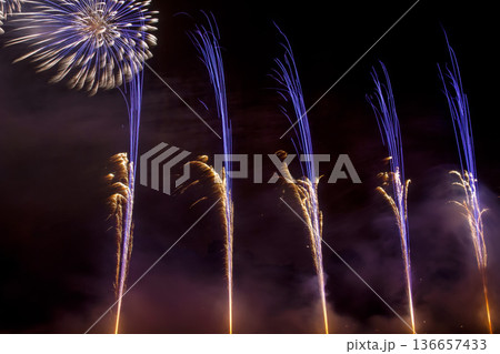 The colorful light of fireworks at Munich Olympiapark, Germany 136657433