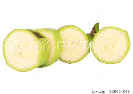 banana green slice cut unripe isolated on white background 136664048
