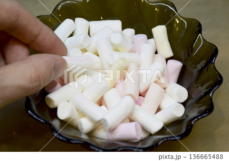 multi-colored marshmallow dessert bars in a glass bowl, close-up 136665488