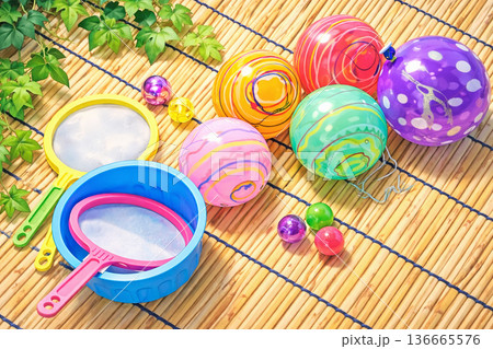 縁日のヨーヨー釣りと金魚すくい道具(AI生成画像) 136665576