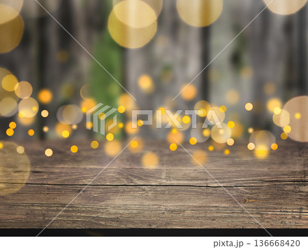 Empty wooden table bokeh light background. Christmas and New year, party background, copy space Empty wooden table bokeh light background. Christmas and New year, party background, copy space 136668420