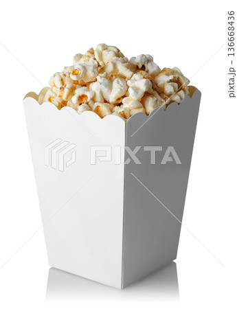 Popcorn in paper bucket isolated on white background 136668436