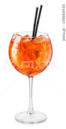 Cold aperol spritz cocktail in glass with straw isolated on white background Cold aperol spritz cocktail in glass with straw isolated on white background 136668438