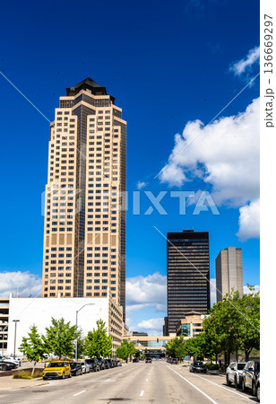 801 Grand building in Des Moines, Iowa. Tallest Postmodern skyscraper in the state features a distinctive copper pyramid roof on Grand Avenue under a blue sky 136669297