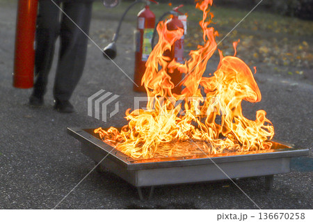 corporate safety - exercise during a firefighting course corporate safety - exercise during a firefighting course 136670258