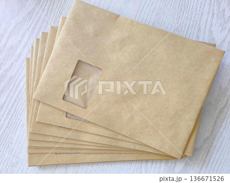 Kraft paper envelopes with a transparent address window 136671526