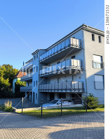 Modern apartment building with balconies 136671532