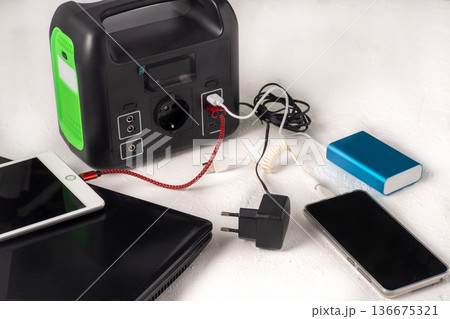 Charging station. A large power bank battery in the absence of electricity. 136675321