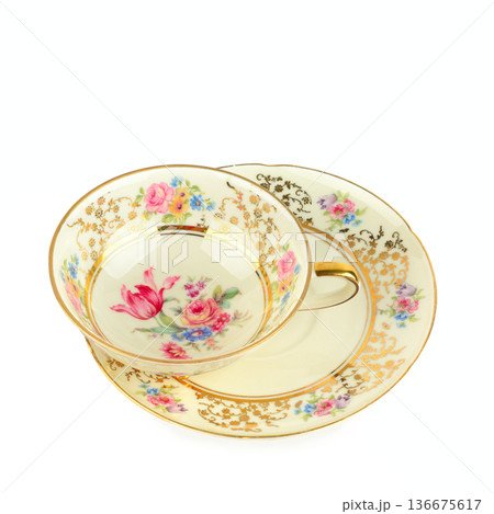 Elegant antique china tea set isolated on white background Elegant antique china tea set isolated on white background 136675617