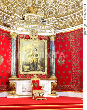 The luxurious interiors of the Peter the Great Hall (Small Throne Room) in the Hermitage Museum in St. Petersburg, Russia. 136676641