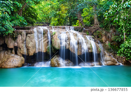Erawan waterfall in tropical forest of national park Kanchanaburi in Thailand. Erawan waterfall in tropical forest of national park Kanchanaburi in Thailand. 136677855