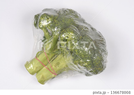 Broccoli Head in Plastic Packaging Broccoli Head in Plastic Packaging 136678008
