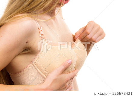 Girl wearing wrong size bra 136678421