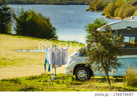 Camping. Clothes hanging to dry by camper rv. 136678687