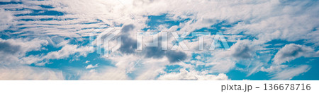 Beautiful cloudy day sky. Daylight Sky texture. Abstract nature background 136678716