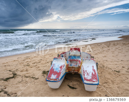 Serene Solitude: Dramatic Skies over Empty Tunisian Shores 136679369