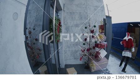 Courier Slips on Icy Porch And Falls on His Back While Holding Gift Box Courier Slips on Icy Porch And Falls on His Back While Holding Gift Box 136679701