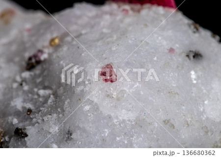 Macro mineral stone Spinel on a black background 136680362